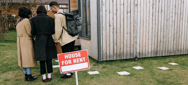 a couple is discussing renting a house to find the cheapest rental in Ohio
